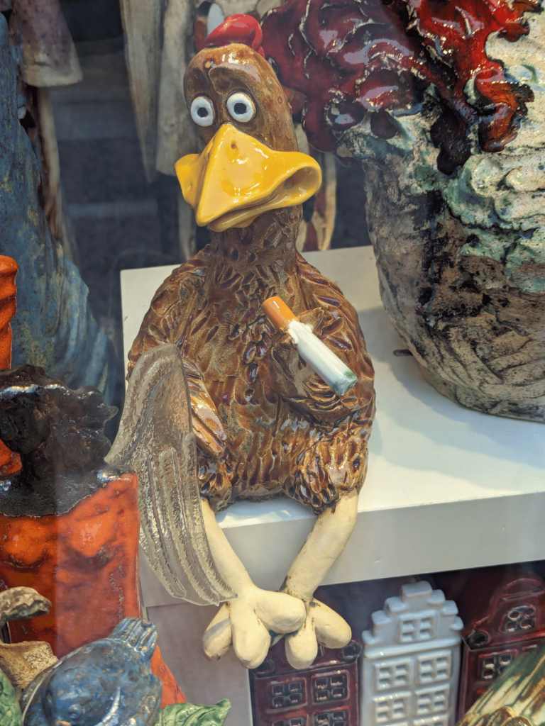 Ceramic chicken smoking cigarette