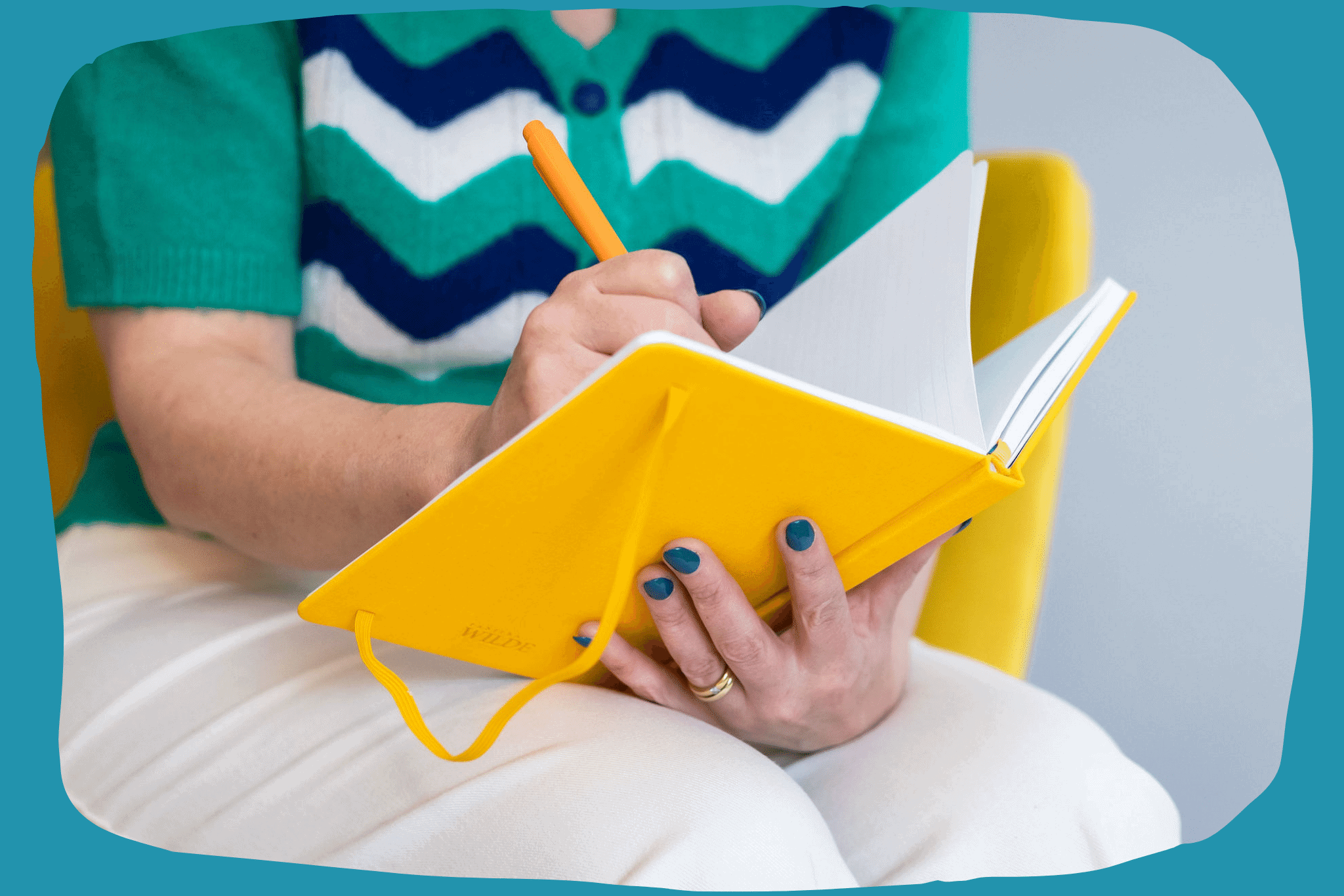 Writing in yellow notebook
